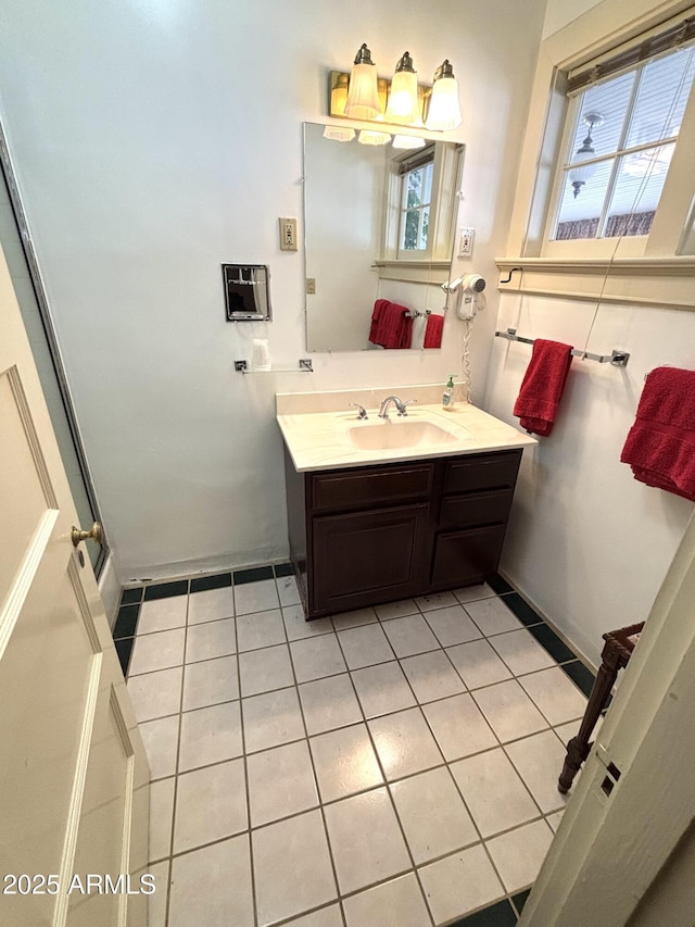 bathroom with vanity and tile patterned floors