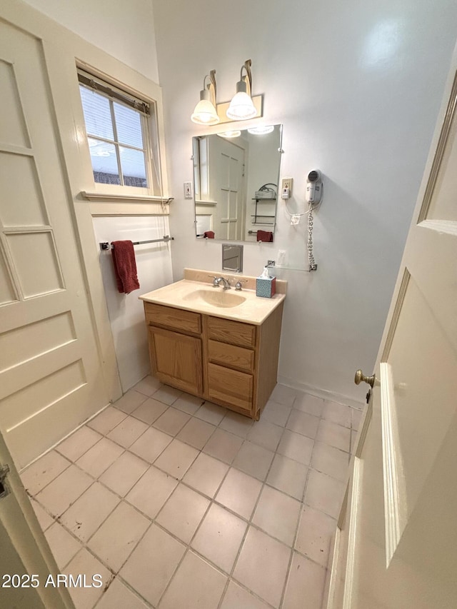 bathroom featuring vanity and tile patterned floors