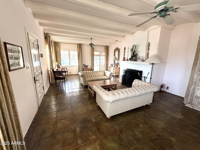 tiled living room featuring ceiling fan and beam ceiling