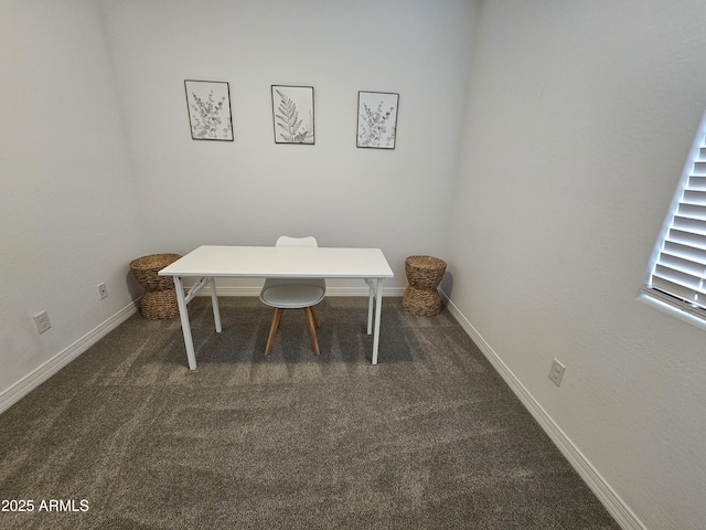9137 W Sells Dr, Phoenix, AZ 85037 - home office with dark carpet and baseboards