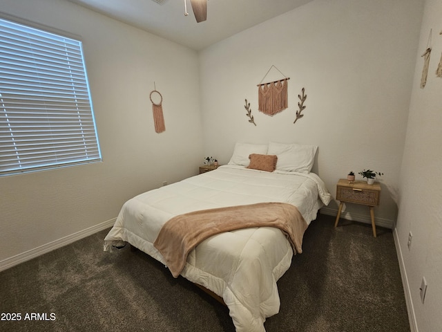 9137 W Sells Dr, Phoenix, AZ 85037 - carpeted bedroom featuring baseboards, a ceiling fan, and multiple windows