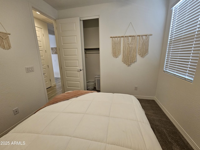 9137 W Sells Dr, Phoenix, AZ 85037 - bedroom with carpet flooring, a closet, and baseboards