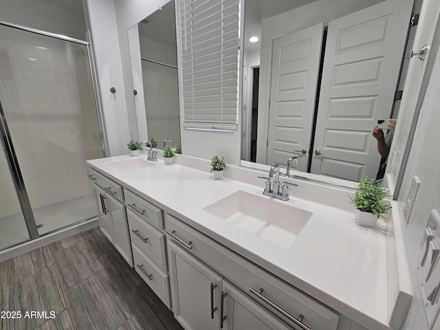 9137 W Sells Dr, Phoenix, AZ 85037 - bathroom featuring double vanity and a stall shower