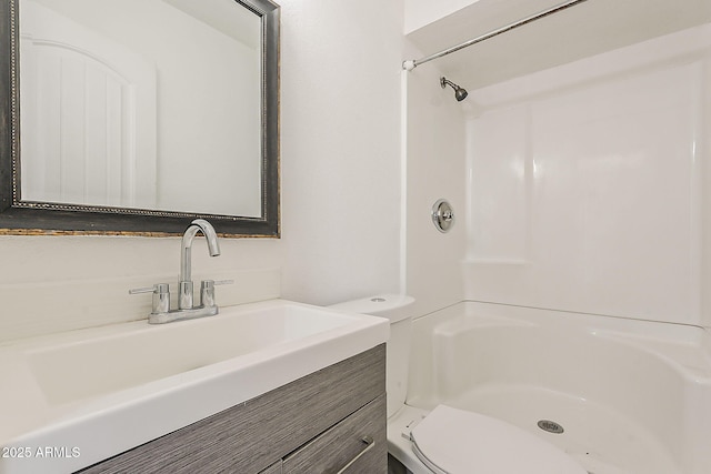 3017 N 46th Dr, Phoenix, AZ 85031 - full bathroom featuring toilet, vanity, and a shower