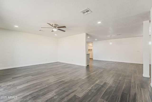 3017 N 46th Dr, Phoenix, AZ 85031 - empty room featuring a ceiling fan, dark wood finished floors, baseboards, and recessed lighting
