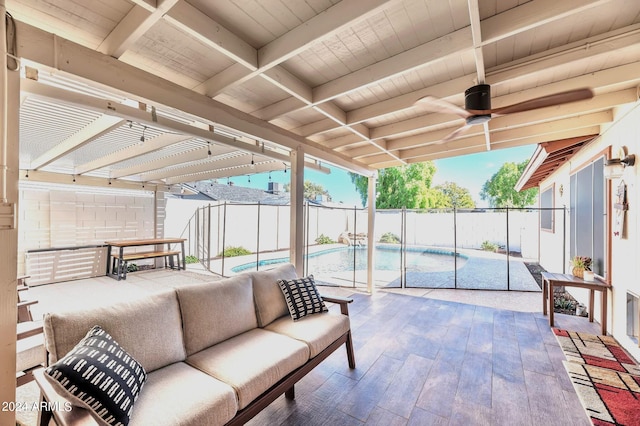 view of patio / terrace featuring a fenced in pool, an outdoor hangout area, a pergola, and ceiling fan