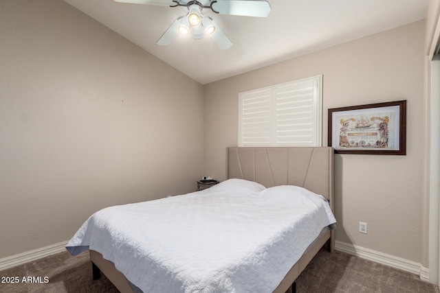 carpeted bedroom with vaulted ceiling, ceiling fan, and baseboards