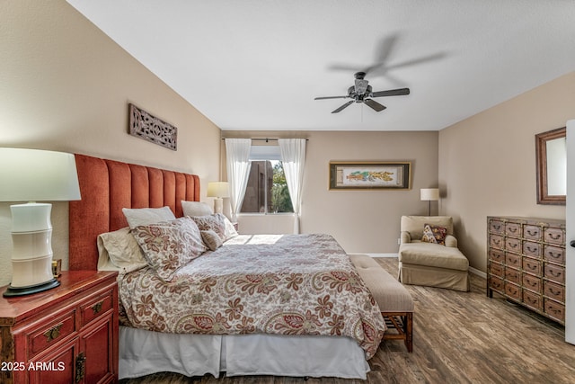 bedroom featuring hardwood / wood-style flooring and ceiling fan