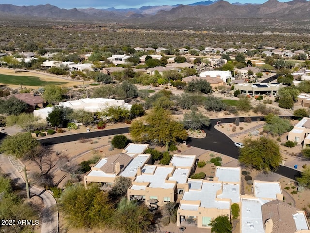 birds eye view of property featuring a mountain view