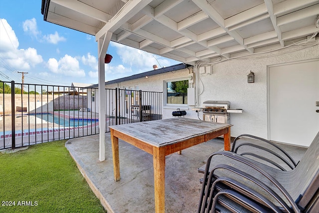 view of terrace with a fenced in pool