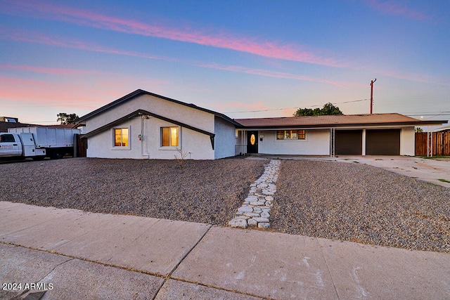 ranch-style home with a garage