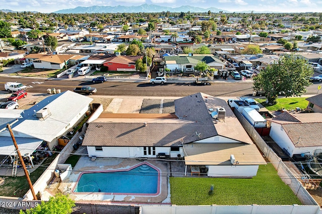 drone / aerial view featuring a mountain view