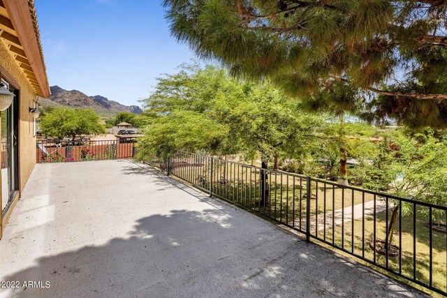 view of patio with a mountain view