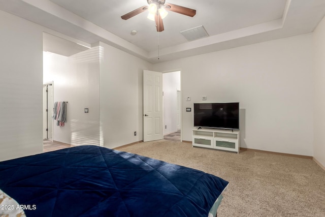 3438 W Little Hopi Dr, Phoenix, AZ 85086 - bedroom with light colored carpet, a raised ceiling, baseboards, and a ceiling fan