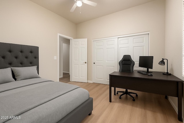 3438 W Little Hopi Dr, Phoenix, AZ 85086 - bedroom featuring an office area, light wood-type flooring, a closet, ceiling fan, and lofted ceiling