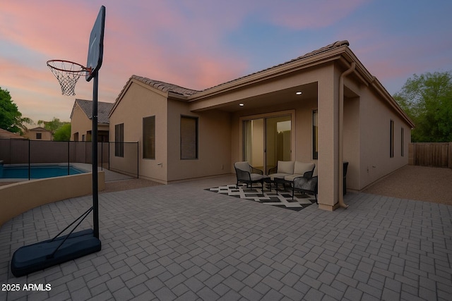 3438 W Little Hopi Dr, Phoenix, AZ 85086 - back of property featuring a patio area, stucco siding, and outdoor lounge area