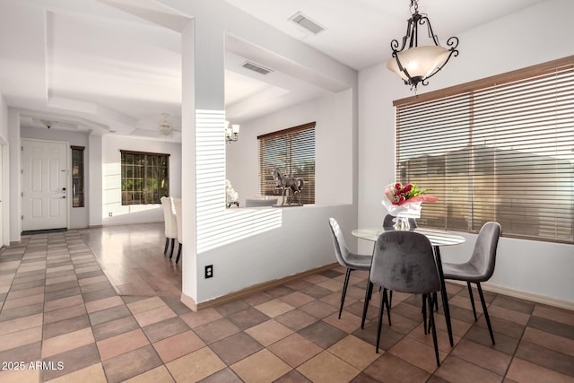 3438 W Little Hopi Dr, Phoenix, AZ 85086 - dining space featuring baseboards, ceiling fan, a raised ceiling, and tile patterned floors