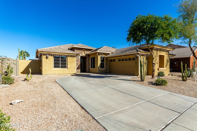 view of front of property with a garage