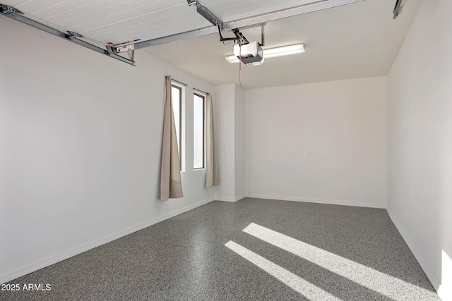 15221 N Clubgate Dr Unit 2059, Scottsdale, AZ 85254 - garage featuring a garage door opener and baseboards