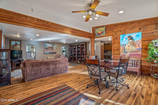 dining room featuring ceiling fan and light hardwood / wood-style floors