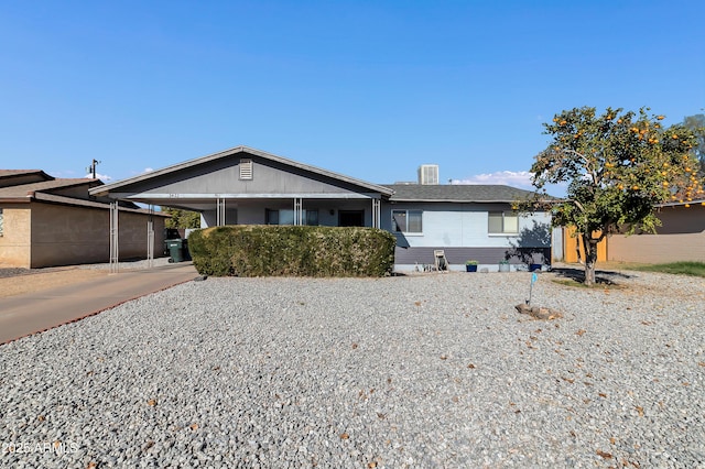 ranch-style house with a carport