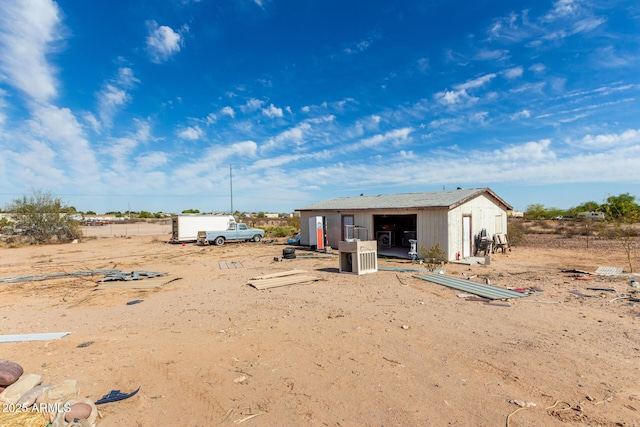 exterior space featuring an outbuilding