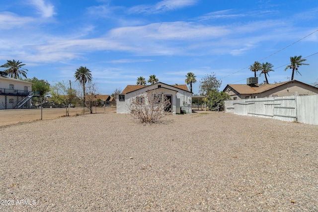 view of yard with central AC