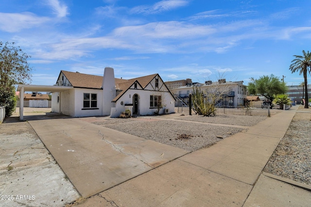 view of front facade with a carport