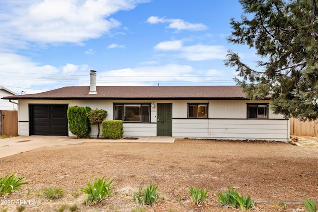 4365 N Tonto Way, Prescott Valley, AZ 86314 - ranch-style house with concrete driveway, an attached garage, roof with shingles, and fence