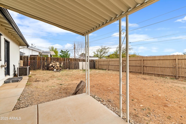 4365 N Tonto Way, Prescott Valley, AZ 86314 - fenced backyard with cooling unit and a patio area