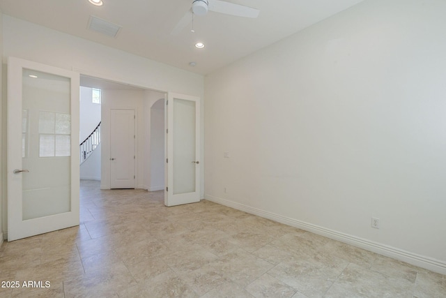 3812 E Camelback Rd, Phoenix, AZ 85018 - empty room with french doors, a ceiling fan, baseboards, and recessed lighting