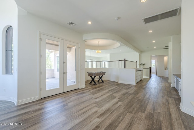 3812 E Camelback Rd, Phoenix, AZ 85018 - entrance foyer featuring wood finished floors, french doors, recessed lighting, and baseboards