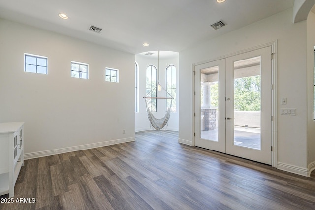 3812 E Camelback Rd, Phoenix, AZ 85018 - doorway to outside with french doors, arched walkways, recessed lighting, dark wood finished floors, and healthy amount of natural light