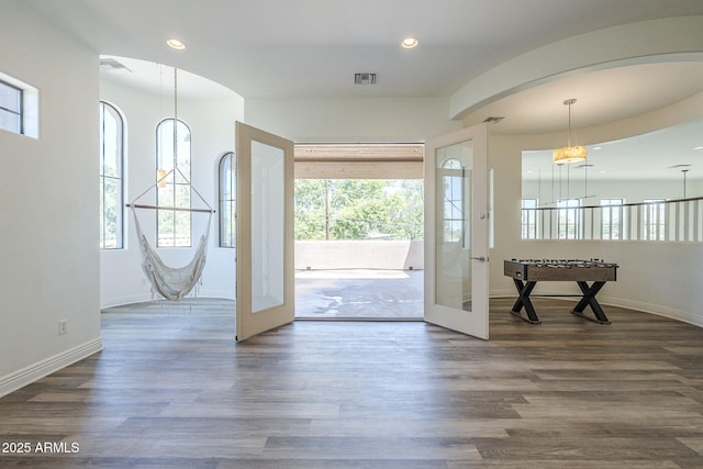 3812 E Camelback Rd, Phoenix, AZ 85018 - entrance foyer featuring french doors, dark wood-style flooring, baseboards, and recessed lighting