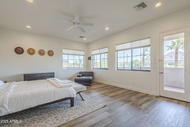 3812 E Camelback Rd, Phoenix, AZ 85018 - bedroom with wood finished floors, recessed lighting, baseboards, and ceiling fan