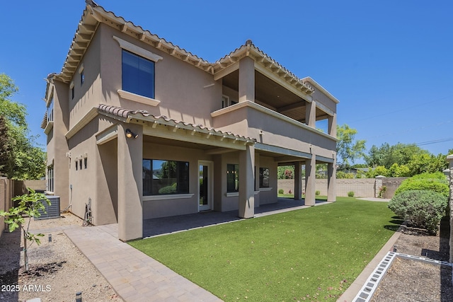 3812 E Camelback Rd, Phoenix, AZ 85018 - rear view of property featuring a balcony, stucco siding, a tile roof, a patio area, and central air condition unit