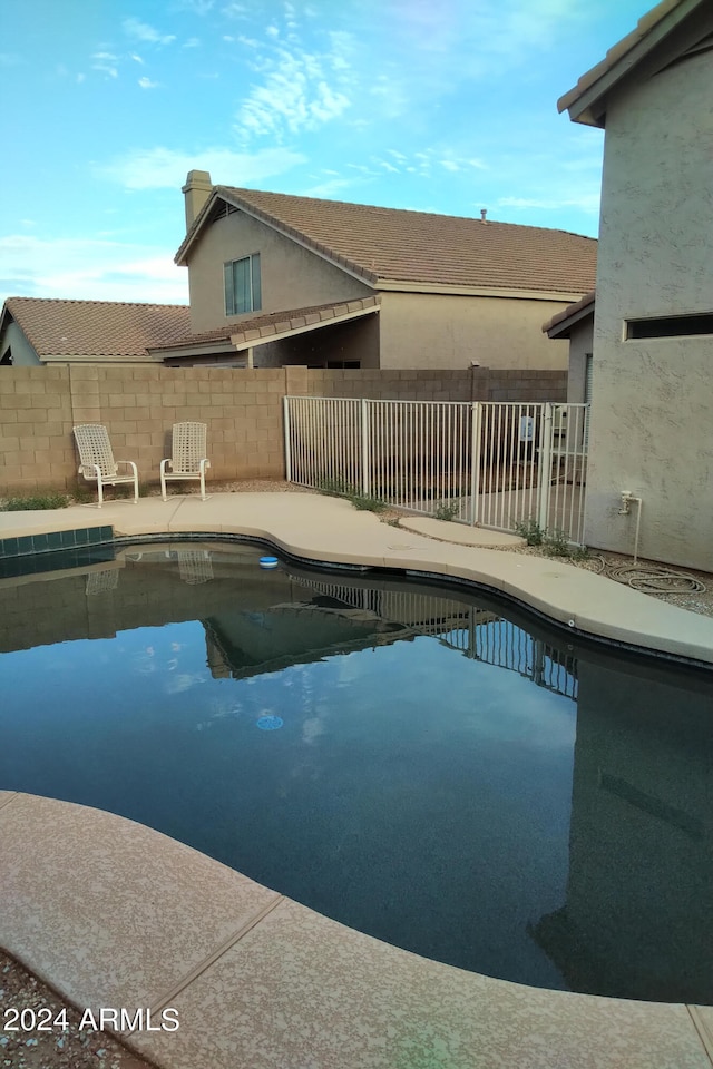 view of pool featuring a patio area