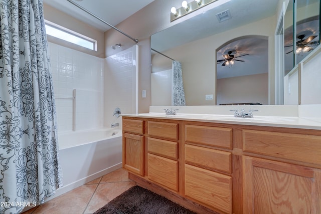 full bath with shower / bath combo, a ceiling fan, a sink, visible vents, and tile patterned flooring
