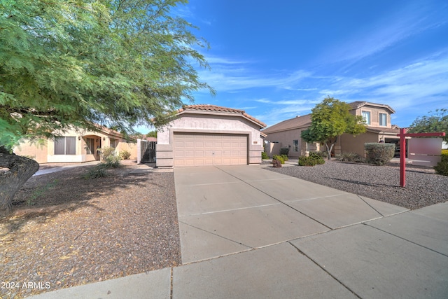 view of front of property with a garage