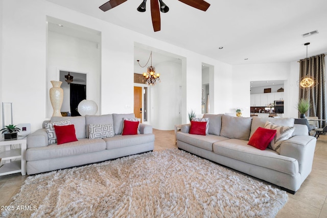 3335 W Carriage Dr, Phoenix, AZ 85086 - living room with visible vents and ceiling fan with notable chandelier
