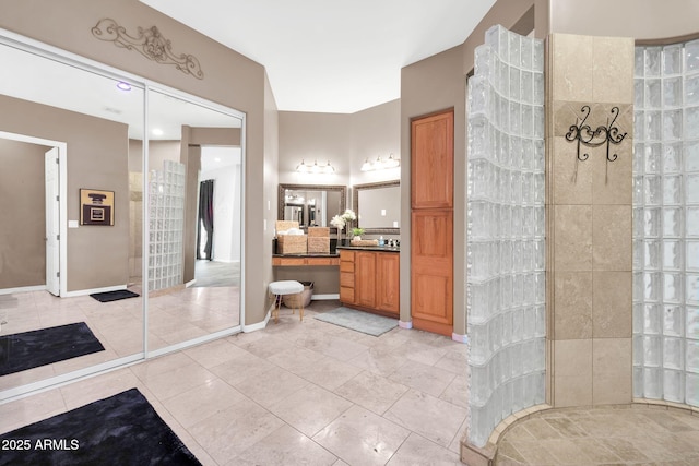 3335 W Carriage Dr, Phoenix, AZ 85086 - bathroom featuring tile patterned floors, a walk in shower, and vanity