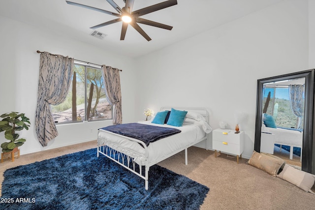 3335 W Carriage Dr, Phoenix, AZ 85086 - bedroom featuring ceiling fan, baseboards, visible vents, and carpet floors