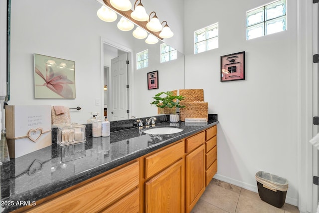 3335 W Carriage Dr, Phoenix, AZ 85086 - bathroom featuring tile patterned floors, vanity, and baseboards