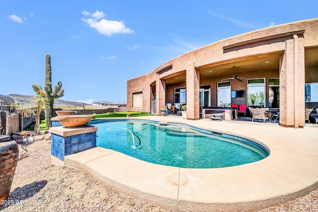 3335 W Carriage Dr, Phoenix, AZ 85086 - view of pool with a fenced in pool, a patio area, and a ceiling fan