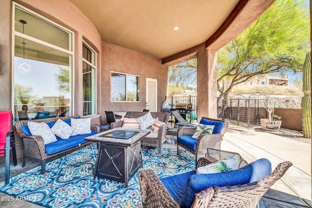 3335 W Carriage Dr, Phoenix, AZ 85086 - view of patio featuring fence and an outdoor living space with a fire pit