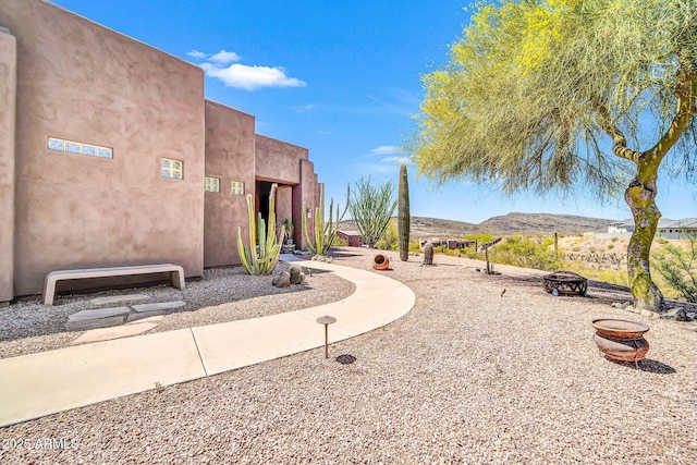 3335 W Carriage Dr, Phoenix, AZ 85086 - view of yard featuring a fire pit and a mountain view
