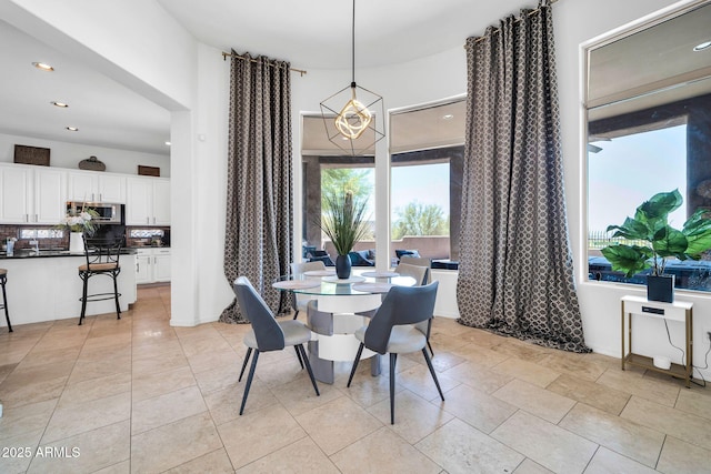 3335 W Carriage Dr, Phoenix, AZ 85086 - dining area with a wealth of natural light, recessed lighting, and a notable chandelier