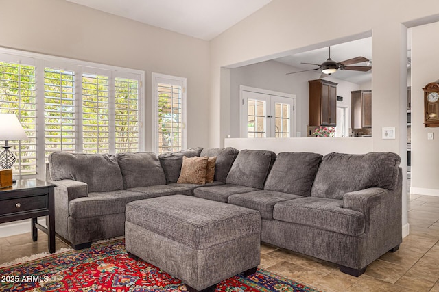 14819 W Lupine Ln, Surprise, AZ 85374 - living room with vaulted ceiling, a ceiling fan, and baseboards