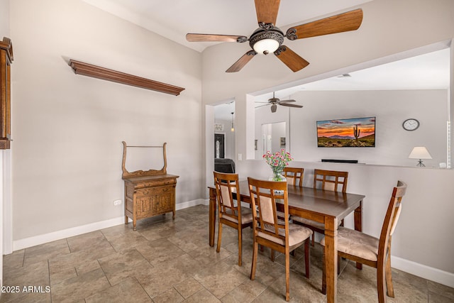 14819 W Lupine Ln, Surprise, AZ 85374 - dining room featuring a ceiling fan, baseboards, and stone finish floors