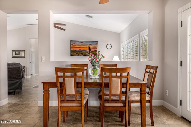 14819 W Lupine Ln, Surprise, AZ 85374 - dining room with a ceiling fan, vaulted ceiling, and baseboards